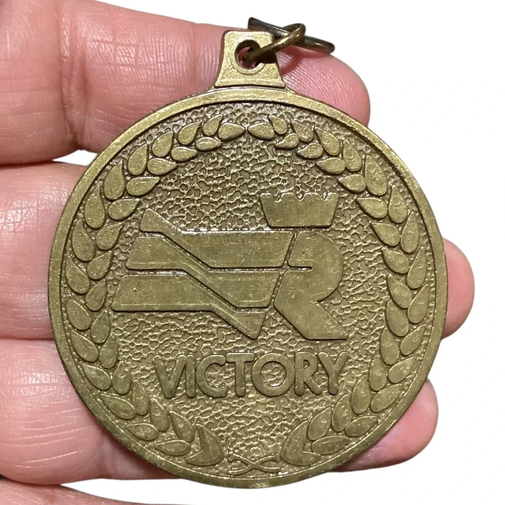 Regency Cruises Victory Medallion Souvenir Keychain Pendant Brass Tone USA